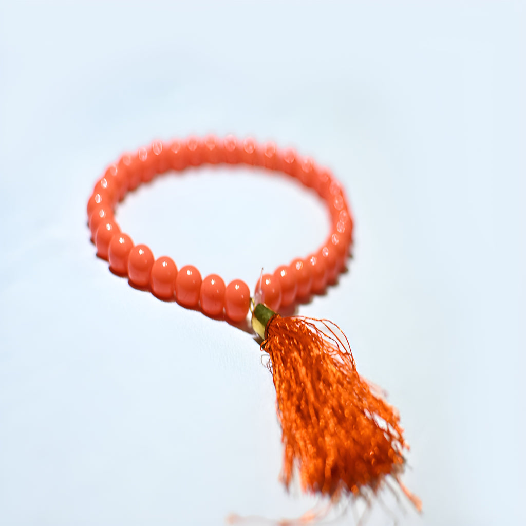 Zamzam Zarqun LLC prayer beads with intricate design, displayed on a white background, used for Islamic prayer and meditation.