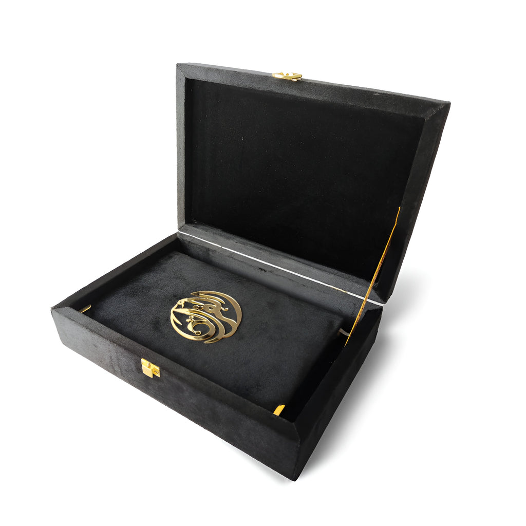 Elegant velvet Quran set with glittering galaxy design and box stand by Zamzam Zarqun LLC, featuring a decorative cover and stand.