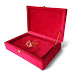 Velvet Quran set with glittering roses design, includes box stand, by Zamzam Zarqun LLC, featuring a richly decorated cover.