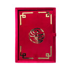 Velvet Quran set with glittering roses design, includes box stand, from Zamzam Zarqun LLC, featuring a decorative cover and intricate details.