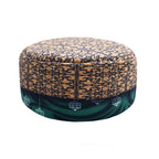 Green lantern prayer cap, traditional topi from Zamzam Zarqun LLC, featuring vibrant green fabric and intricate embroidery.