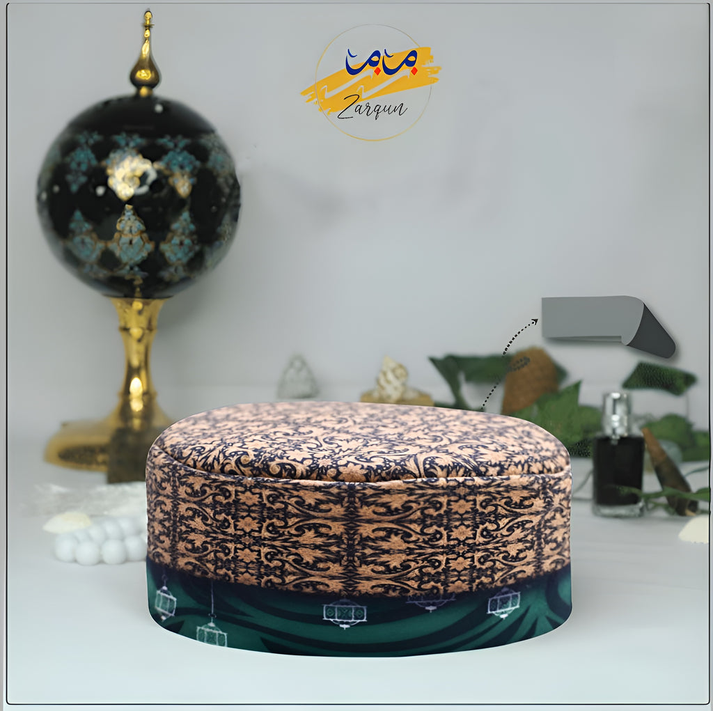 Green lantern prayer cap from Zamzam Zarqun LLC, traditional topi with intricate embroidery, designed for Islamic prayer wear.