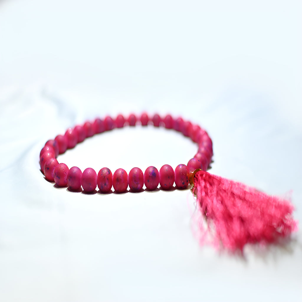 Elegant BLOOMS OF FAITH prayer beads by Zamzam Zarqun LLC with intricate floral design and polished beads.